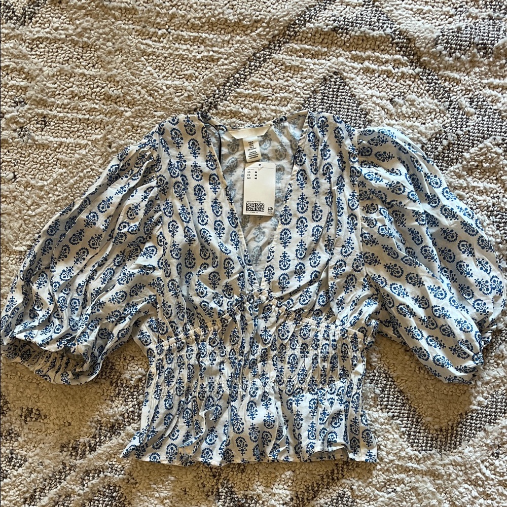 Women’s blue and white blouse
